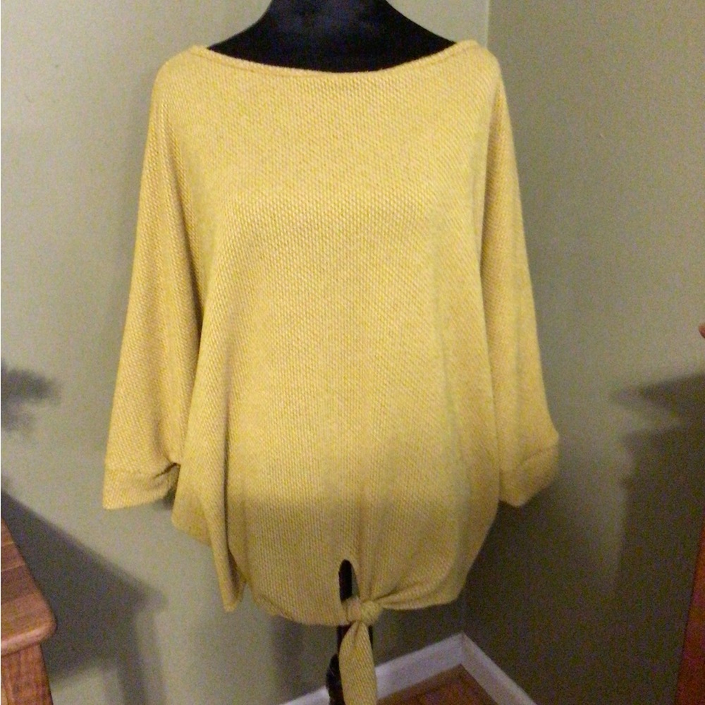 Gold polyester spandex machine washable sweater. Size L